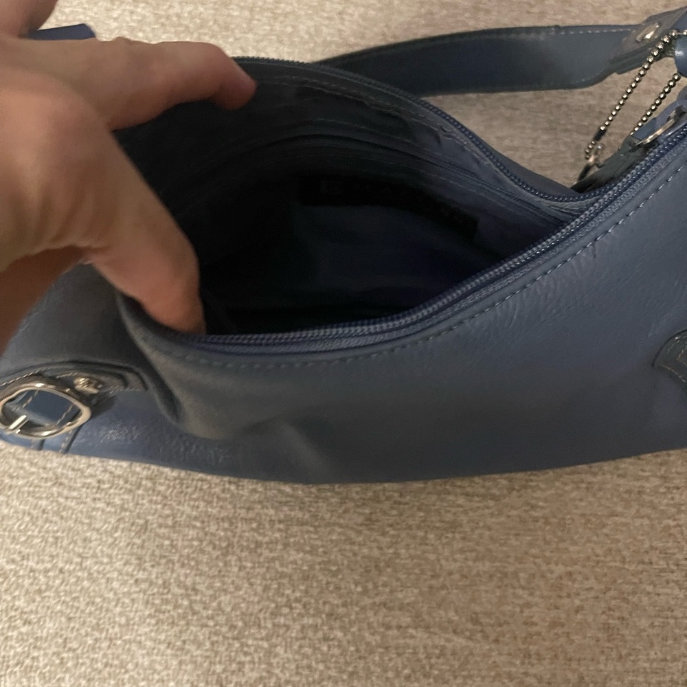 Gently used leather handbag